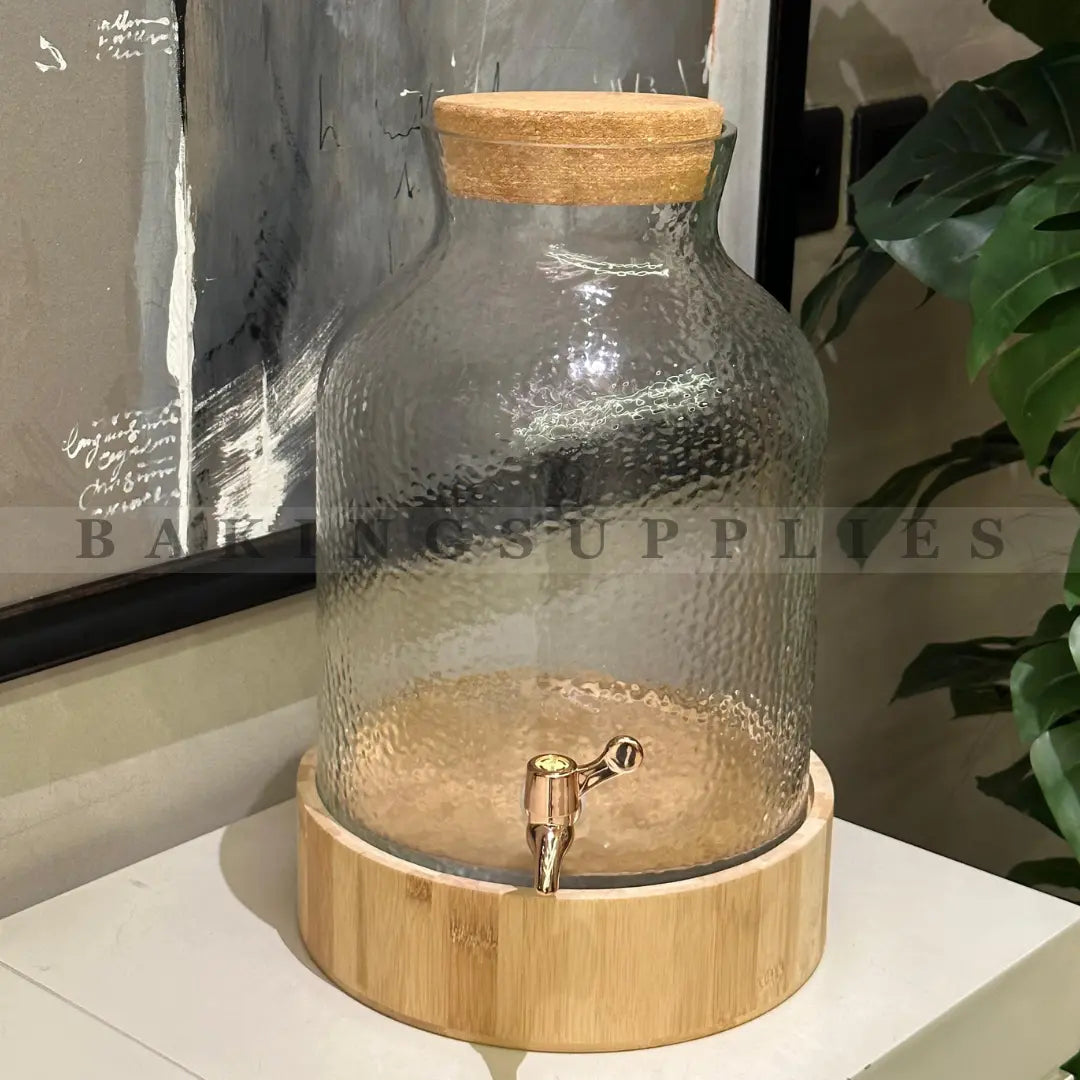 Clear glass container with wooden base and lid