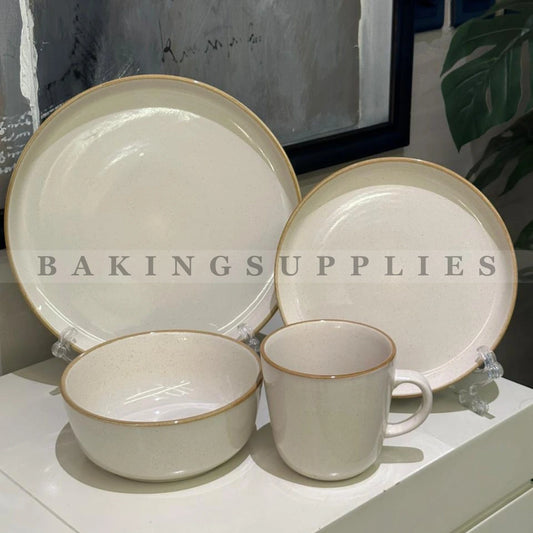 Ceramic dinnerware set with beige and gold trim