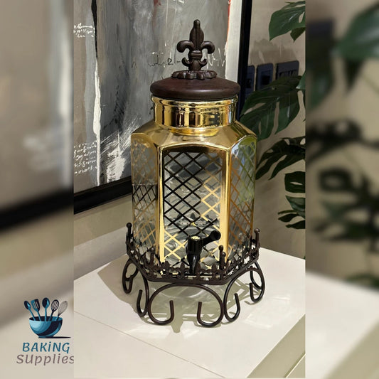 Decorative gold lantern with a brown top on a white surface.