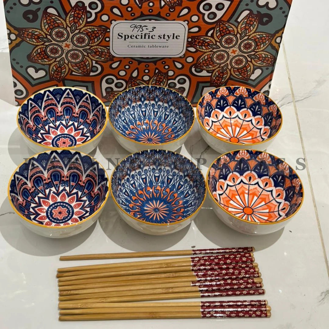 Set of six patterned bowls with chopsticks 