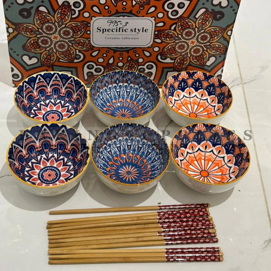Set of six patterned bowls with chopsticks 